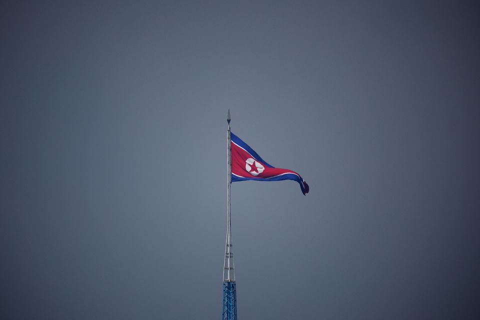 A North Korean flag billows in the propaganda village of Gijungdong in North Korea, located near the ceasefire village of Panmunjom inside the demilitarized zone (DMZ) separating the two Koreas.