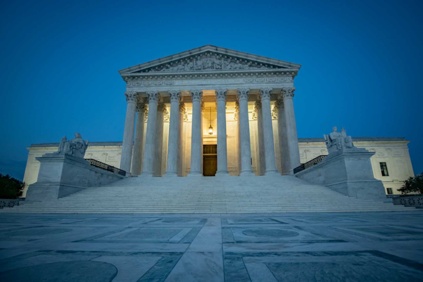 The U.S. Supreme Court building at night