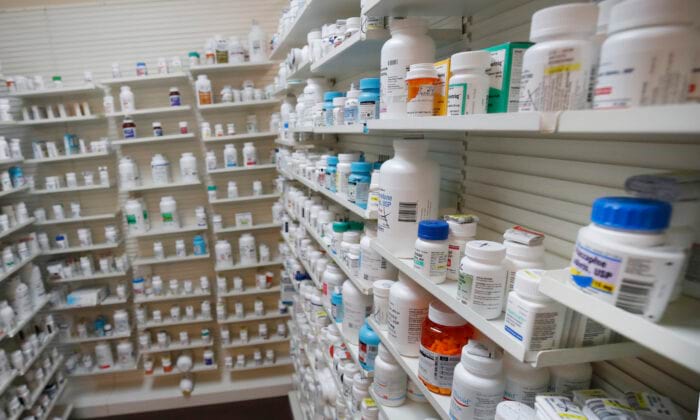 Bottles of pills sit on shelves at Rock Canyon Pharmacy in Provo, Utah, on May 20, 2020. (George Frey/AFP via Getty Images)